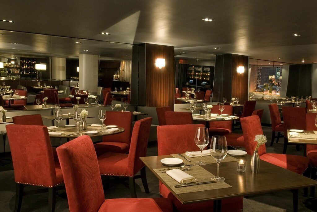 clear wine glasses on top of dining table