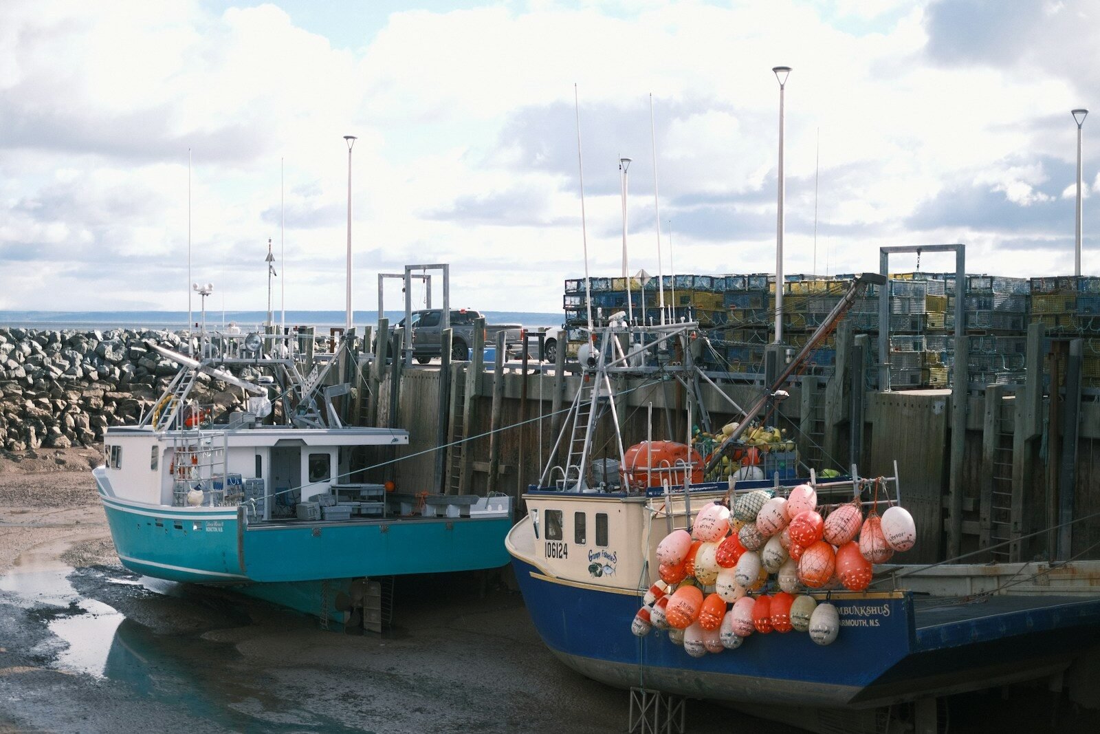 A couple of boats that are sitting in the water